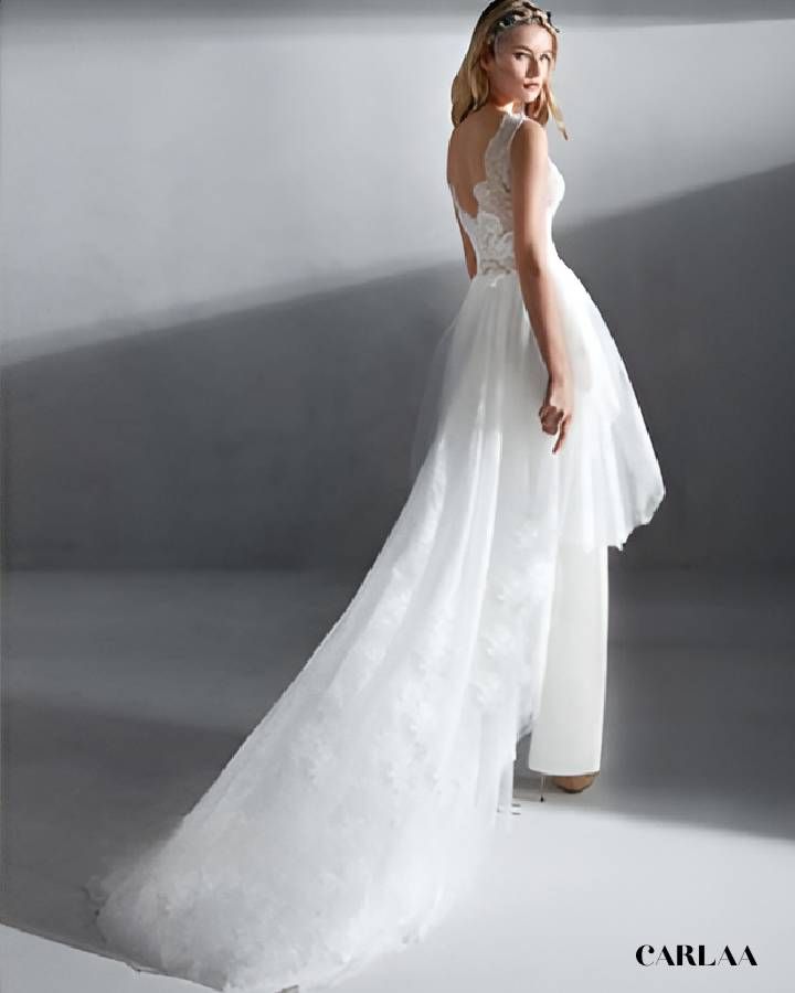 élégance de mariage en combi pantalon blanche